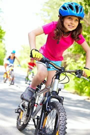 Girl riding bike that will not have to be sold if you go bankrupt
