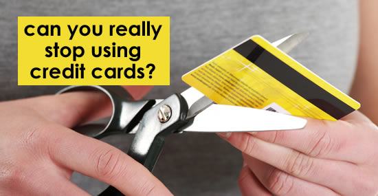 woman cutting up a credit card - can you stop using cards? 