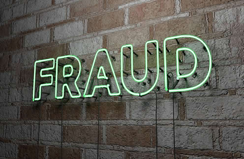 neon sign saying fraud - is your name on a fraud database? Is this an error?