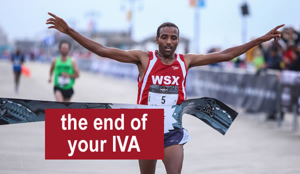 Crossing the finishing line of a marathon - getting to the end of your IVA can feel like this