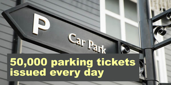 Sign to a car park - 50,000 parking tickets are issued every day in the UK. One every 2 seconds. 