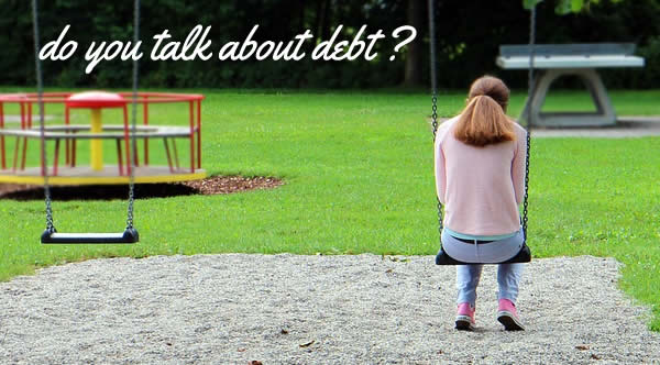 Woman alone in a park - do you talk about debt?