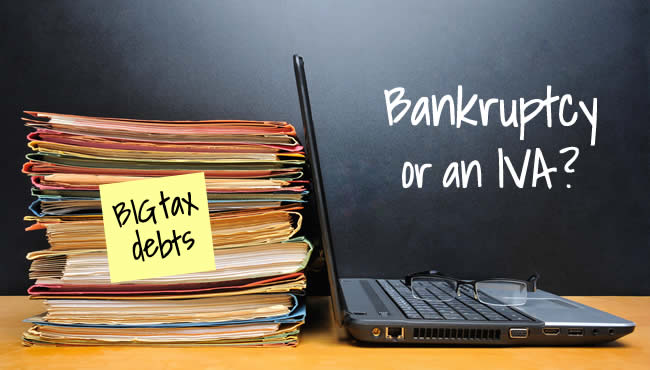 pile of files labelled "big tax debts" - ishould you choose bankruptcy or an IVA?