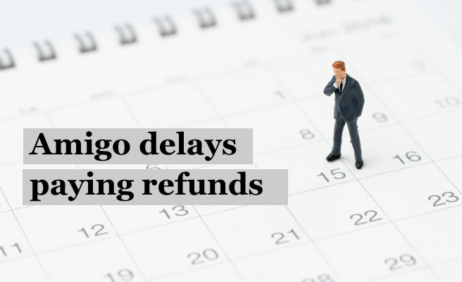 man staring at a calendar - whu is Amigo allowed to delay paying refunds?