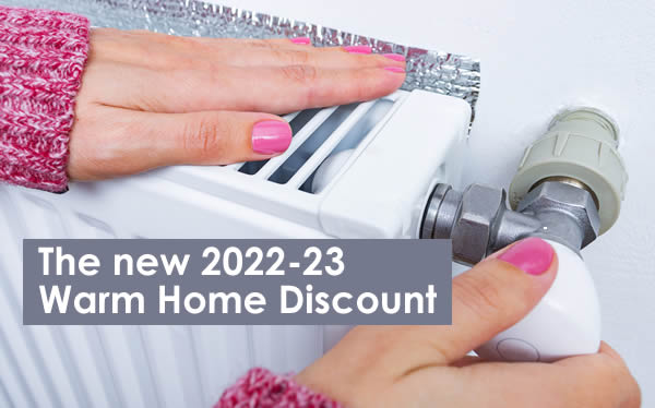 Woman changing radiator setting = will you be able to get £150 from the new Warm Home Discount Scheme in 2022-23? 