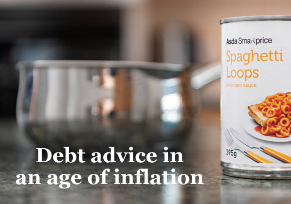 A saucepan and a can of cheap spaghetti hoops - Debt Advice in an age of inflation